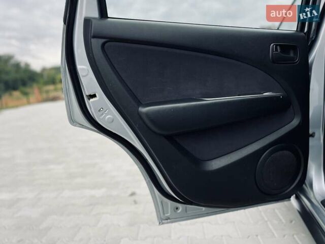 Сірий Міцубісі Аутлендер, об'ємом двигуна 2 л та пробігом 300 тис. км за 5150 $, фото 20 на Automoto.ua