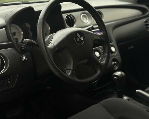 Сірий Міцубісі Аутлендер, об'ємом двигуна 2.4 л та пробігом 98 тис. км за 7199 $, фото 58 на Automoto.ua