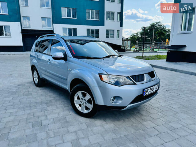 Серый Мицубиси Аутлендер, объемом двигателя 2 л и пробегом 179 тыс. км за 9500 $, фото 14 на Automoto.ua