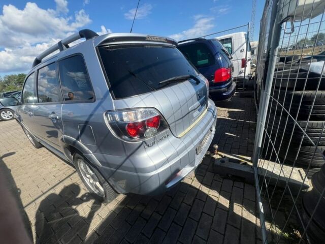 Серый Мицубиси Аутлендер, объемом двигателя 2.4 л и пробегом 220 тыс. км за 3369 $, фото 2 на Automoto.ua