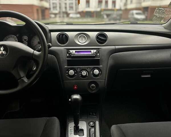 Сірий Міцубісі Аутлендер, об'ємом двигуна 2.4 л та пробігом 98 тис. км за 7199 $, фото 63 на Automoto.ua