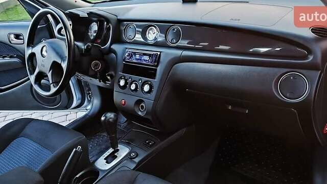 Серый Мицубиси Аутлендер, объемом двигателя 2.38 л и пробегом 228 тыс. км за 7900 $, фото 13 на Automoto.ua