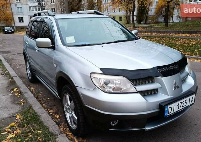 Сірий Міцубісі Аутлендер, об'ємом двигуна 2 л та пробігом 312 тис. км за 8300 $, фото 6 на Automoto.ua