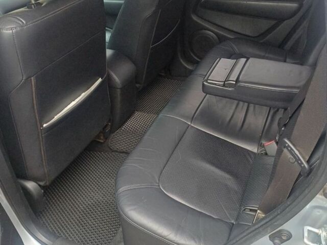 Серый Мицубиси Аутлендер, объемом двигателя 2.4 л и пробегом 240 тыс. км за 7300 $, фото 6 на Automoto.ua