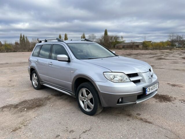 Серый Мицубиси Аутлендер, объемом двигателя 2.4 л и пробегом 264 тыс. км за 6300 $, фото 8 на Automoto.ua