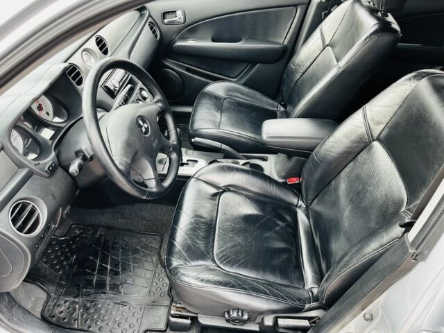 Серый Мицубиси Аутлендер, объемом двигателя 2.4 л и пробегом 264 тыс. км за 6300 $, фото 16 на Automoto.ua