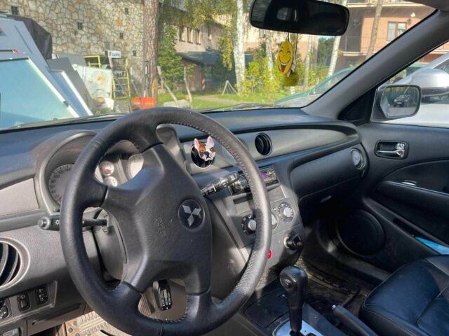 Серый Мицубиси Аутлендер, объемом двигателя 2.4 л и пробегом 127 тыс. км за 4400 $, фото 5 на Automoto.ua