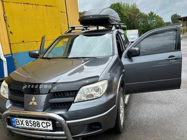 Мицубиси Аутлендер 2006 в Хмельницком на Automoto.ua Серый Мицубиси Аутлендер, объемом двигателя 2.4 л и пробегом 240 тыс. км за 6500 $, фото 6 на Automoto.ua