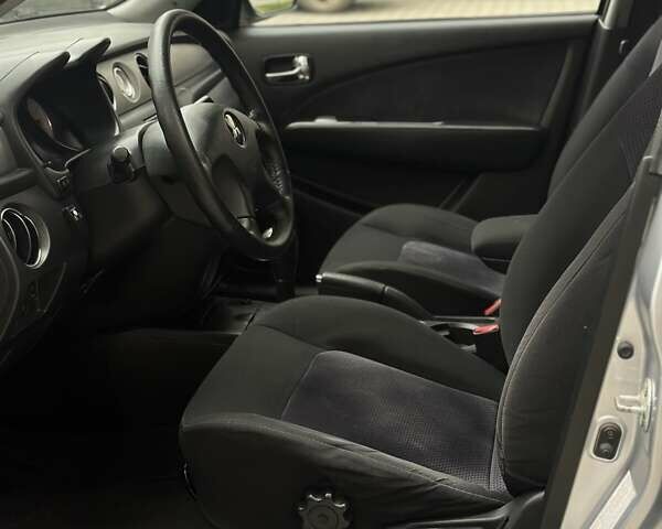 Сірий Міцубісі Аутлендер, об'ємом двигуна 2.4 л та пробігом 98 тис. км за 7199 $, фото 61 на Automoto.ua