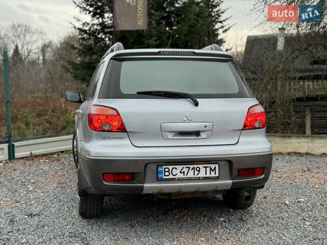 Серый Мицубиси Аутлендер, объемом двигателя 2.38 л и пробегом 204 тыс. км за 6990 $, фото 30 на Automoto.ua