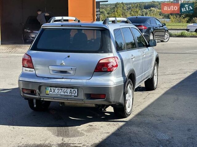 Сірий Міцубісі Аутлендер, об'ємом двигуна 2 л та пробігом 214 тис. км за 4500 $, фото 2 на Automoto.ua