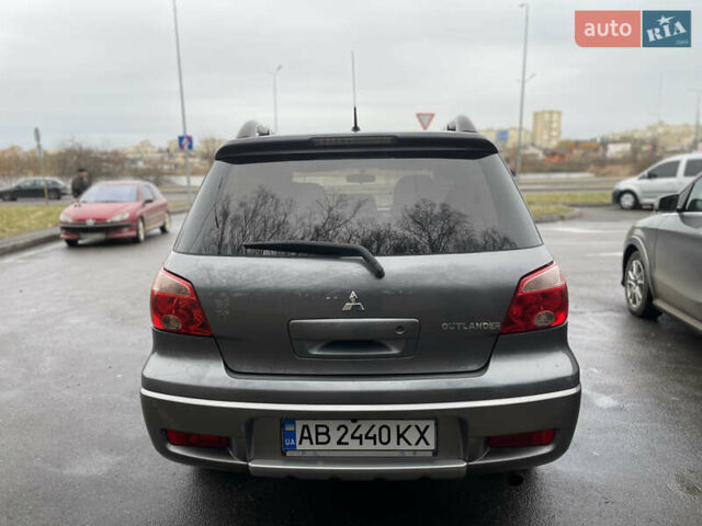 Серый Мицубиси Аутлендер, объемом двигателя 2 л и пробегом 275 тыс. км за 6950 $, фото 7 на Automoto.ua