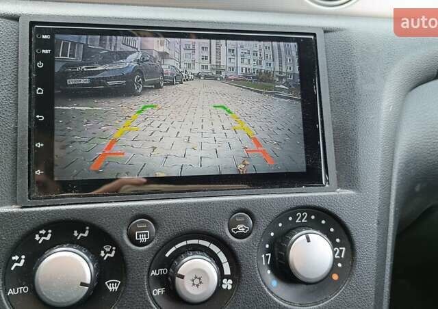 Сірий Міцубісі Аутлендер, об'ємом двигуна 2 л та пробігом 312 тис. км за 8300 $, фото 12 на Automoto.ua