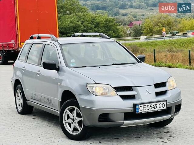 Сірий Міцубісі Аутлендер, об'ємом двигуна 2 л та пробігом 300 тис. км за 5650 $, фото 17 на Automoto.ua