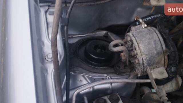 Серый Мицубиси Аутлендер, объемом двигателя 2.4 л и пробегом 261 тыс. км за 5700 $, фото 3 на Automoto.ua