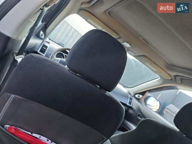 Серый Мицубиси Аутлендер, объемом двигателя 3 л и пробегом 320 тыс. км за 7700 $, фото 11 на Automoto.ua