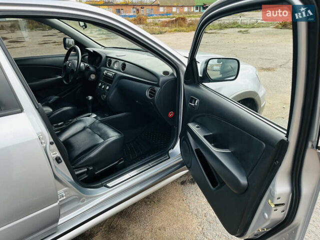 Серый Мицубиси Аутлендер, объемом двигателя 2.4 л и пробегом 264 тыс. км за 6300 $, фото 12 на Automoto.ua