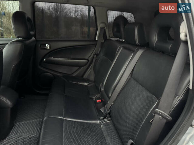 Серый Мицубиси Аутлендер, объемом двигателя 2.38 л и пробегом 204 тыс. км за 6990 $, фото 9 на Automoto.ua