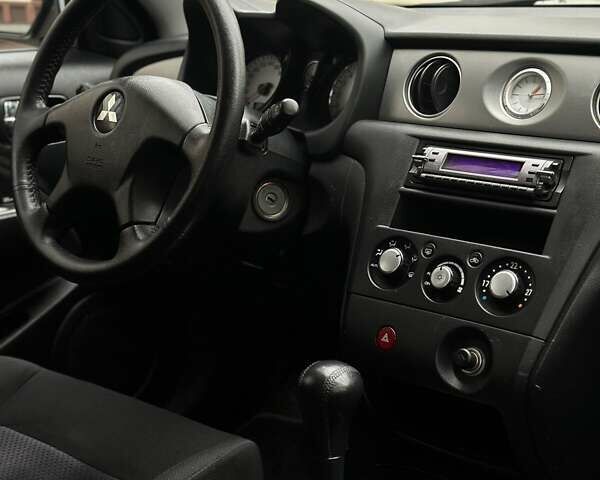 Сірий Міцубісі Аутлендер, об'ємом двигуна 2.4 л та пробігом 98 тис. км за 7199 $, фото 81 на Automoto.ua