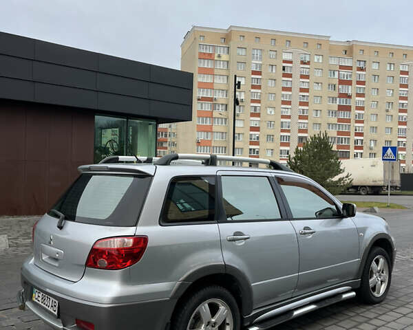 Серый Мицубиси Аутлендер, объемом двигателя 2.38 л и пробегом 180 тыс. км за 6000 $, фото 10 на Automoto.ua