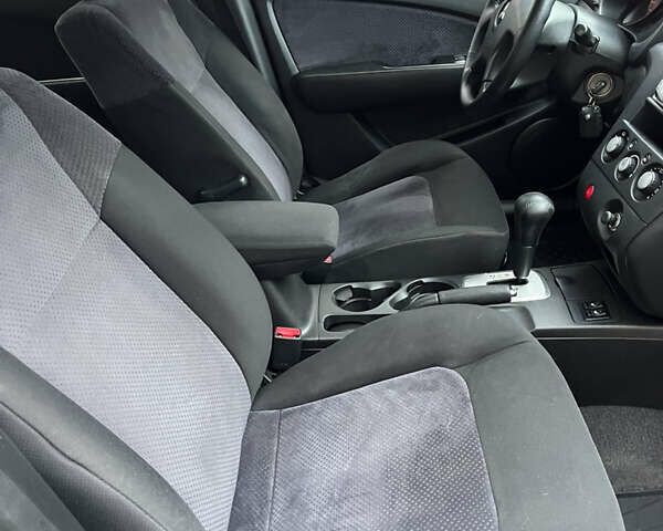 Серый Мицубиси Аутлендер, объемом двигателя 2.38 л и пробегом 180 тыс. км за 6000 $, фото 26 на Automoto.ua