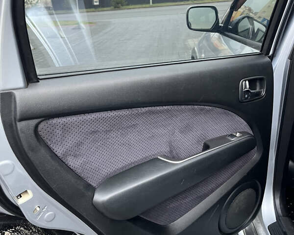 Серый Мицубиси Аутлендер, объемом двигателя 2.38 л и пробегом 180 тыс. км за 6000 $, фото 19 на Automoto.ua