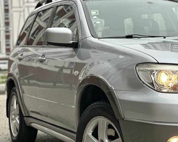 Сірий Міцубісі Аутлендер, об'ємом двигуна 2.4 л та пробігом 98 тис. км за 7199 $, фото 26 на Automoto.ua