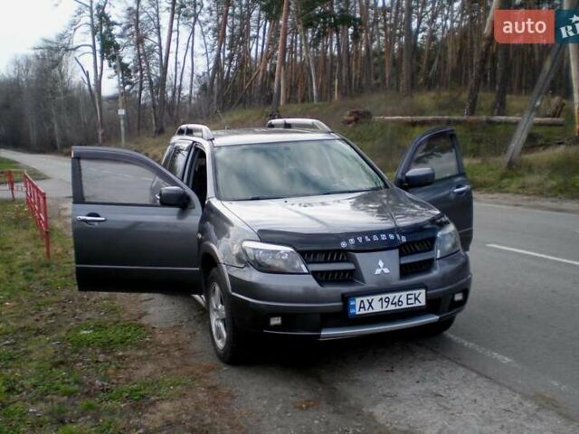 Серый Мицубиси Аутлендер, объемом двигателя 2.4 л и пробегом 235 тыс. км за 6500 $, фото 14 на Automoto.ua
