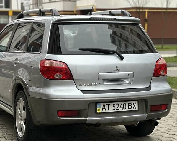 Сірий Міцубісі Аутлендер, об'ємом двигуна 2.4 л та пробігом 98 тис. км за 7199 $, фото 37 на Automoto.ua