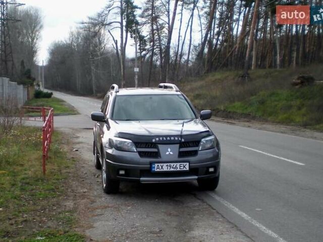 Серый Мицубиси Аутлендер, объемом двигателя 2.4 л и пробегом 235 тыс. км за 6500 $, фото 15 на Automoto.ua