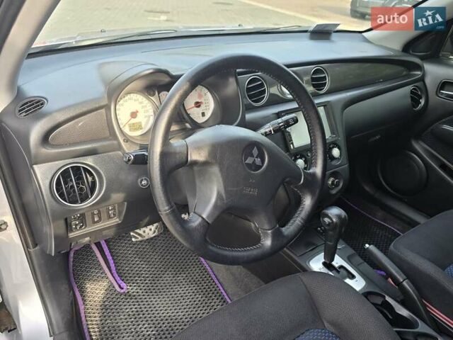 Серый Мицубиси Аутлендер, объемом двигателя 2.4 л и пробегом 243 тыс. км за 6999 $, фото 8 на Automoto.ua