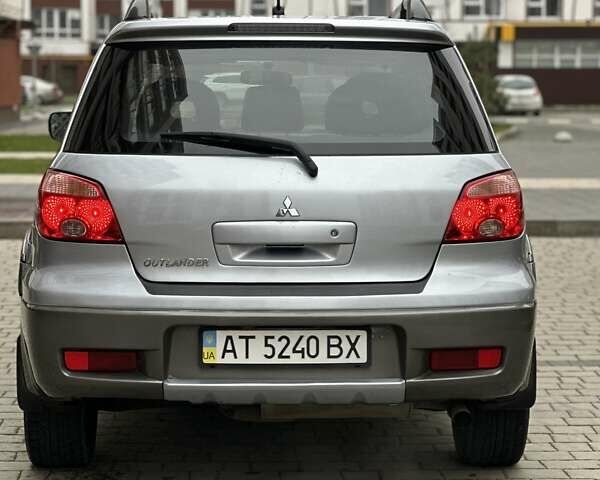 Сірий Міцубісі Аутлендер, об'ємом двигуна 2.4 л та пробігом 98 тис. км за 7199 $, фото 34 на Automoto.ua