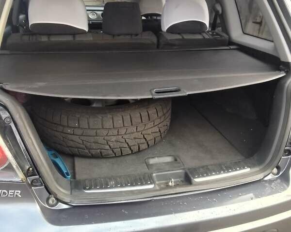 Серый Мицубиси Аутлендер, объемом двигателя 2 л и пробегом 154 тыс. км за 6500 $, фото 9 на Automoto.ua