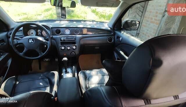 Сірий Міцубісі Аутлендер, об'ємом двигуна 2.38 л та пробігом 204 тис. км за 6500 $, фото 3 на Automoto.ua