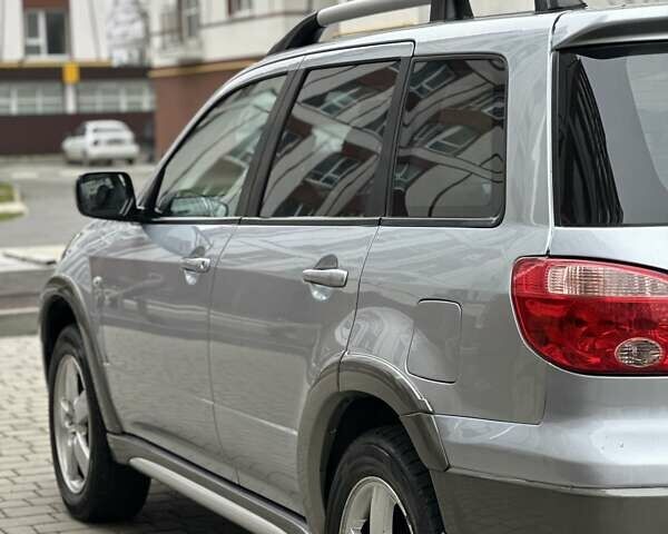 Сірий Міцубісі Аутлендер, об'ємом двигуна 2.4 л та пробігом 98 тис. км за 7199 $, фото 39 на Automoto.ua