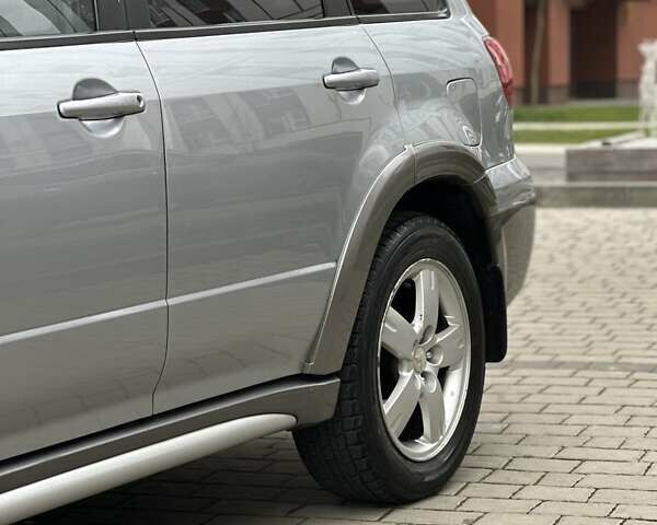 Сірий Міцубісі Аутлендер, об'ємом двигуна 2.4 л та пробігом 98 тис. км за 7199 $, фото 13 на Automoto.ua