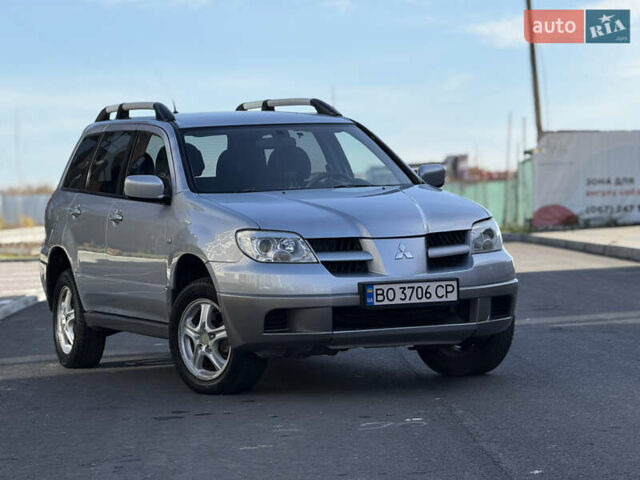 Сірий Міцубісі Аутлендер, об'ємом двигуна 2 л та пробігом 235 тис. км за 5200 $, фото 4 на Automoto.ua