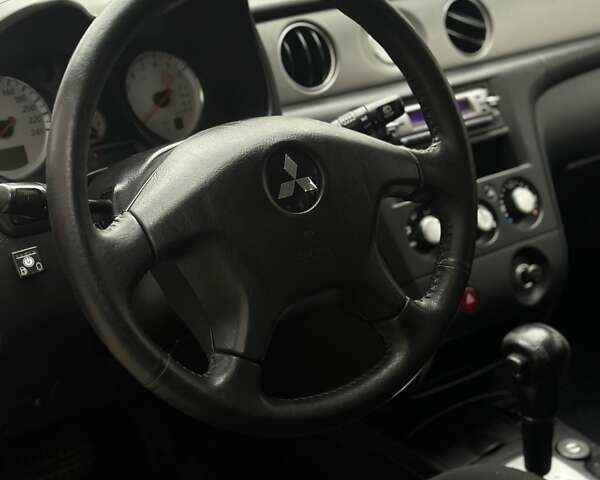 Сірий Міцубісі Аутлендер, об'ємом двигуна 2.4 л та пробігом 98 тис. км за 7199 $, фото 59 на Automoto.ua