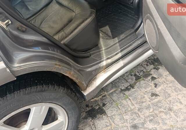 Серый Мицубиси Аутлендер, объемом двигателя 2.38 л и пробегом 600 тыс. км за 5700 $, фото 8 на Automoto.ua