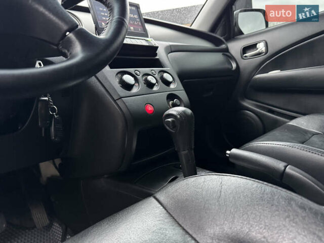 Серый Мицубиси Аутлендер, объемом двигателя 2.38 л и пробегом 204 тыс. км за 6990 $, фото 7 на Automoto.ua