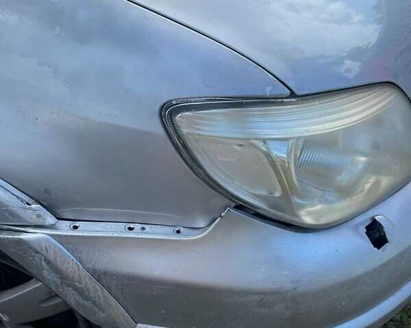 Серый Мицубиси Аутлендер, объемом двигателя 2.4 л и пробегом 127 тыс. км за 4400 $, фото 3 на Automoto.ua