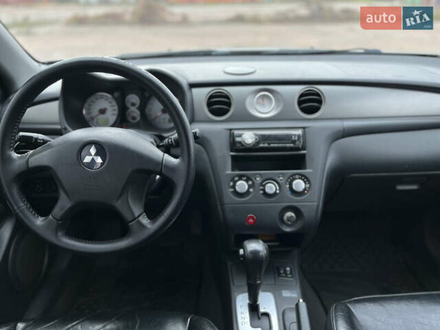 Серый Мицубиси Аутлендер, объемом двигателя 2.4 л и пробегом 264 тыс. км за 6300 $, фото 17 на Automoto.ua