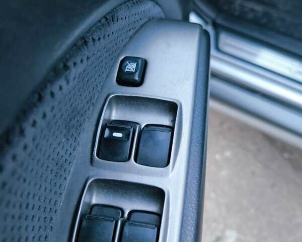 Мицубиси Аутлендер 2006 в Чернигове на Automoto.ua Серый Мицубиси Аутлендер, объемом двигателя 2.4 л и пробегом 147 тыс. км за 6900 $, фото 23 на Automoto.ua