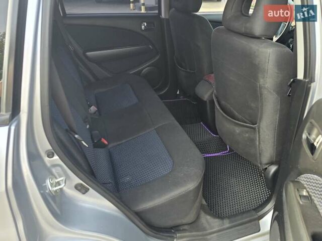 Серый Мицубиси Аутлендер, объемом двигателя 2.4 л и пробегом 243 тыс. км за 6999 $, фото 13 на Automoto.ua