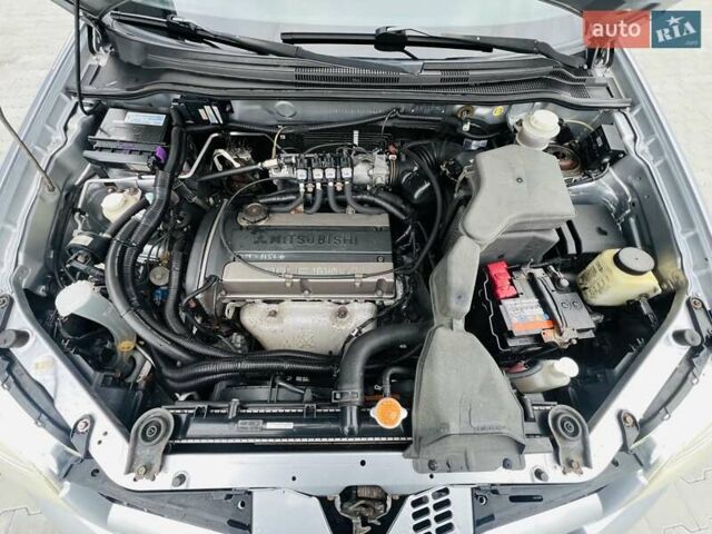 Сірий Міцубісі Аутлендер, об'ємом двигуна 2 л та пробігом 300 тис. км за 5150 $, фото 25 на Automoto.ua