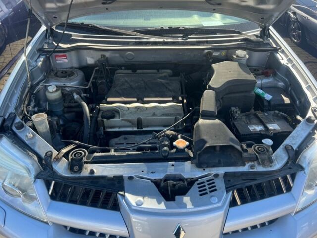 Серый Мицубиси Аутлендер, объемом двигателя 2.4 л и пробегом 220 тыс. км за 3369 $, фото 10 на Automoto.ua