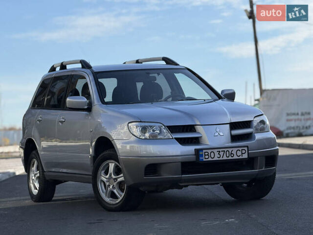 Сірий Міцубісі Аутлендер, об'ємом двигуна 2 л та пробігом 235 тис. км за 5200 $, фото 5 на Automoto.ua