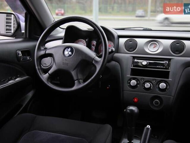 Серый Мицубиси Аутлендер, объемом двигателя 2.4 л и пробегом 171 тыс. км за 8200 $, фото 10 на Automoto.ua