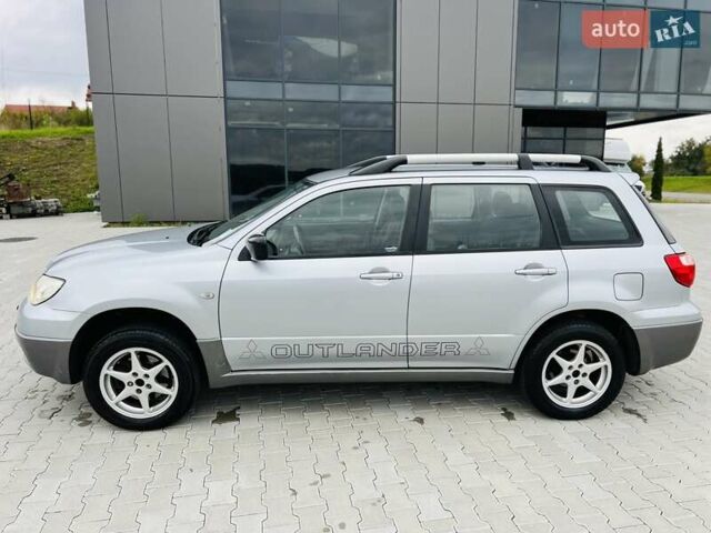 Сірий Міцубісі Аутлендер, об'ємом двигуна 2 л та пробігом 300 тис. км за 5150 $, фото 11 на Automoto.ua