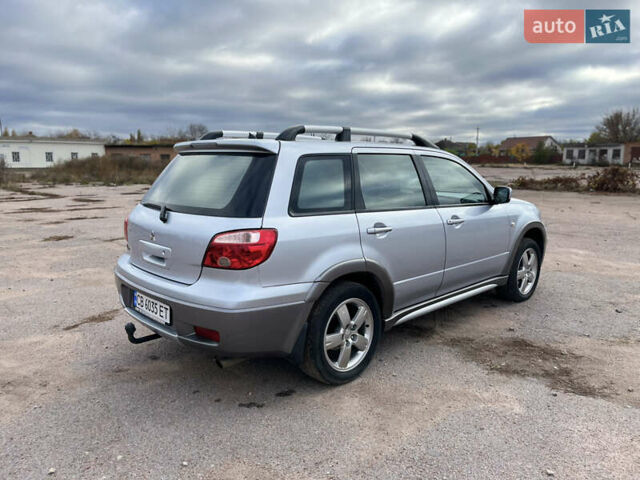 Серый Мицубиси Аутлендер, объемом двигателя 2.4 л и пробегом 264 тыс. км за 6300 $, фото 6 на Automoto.ua